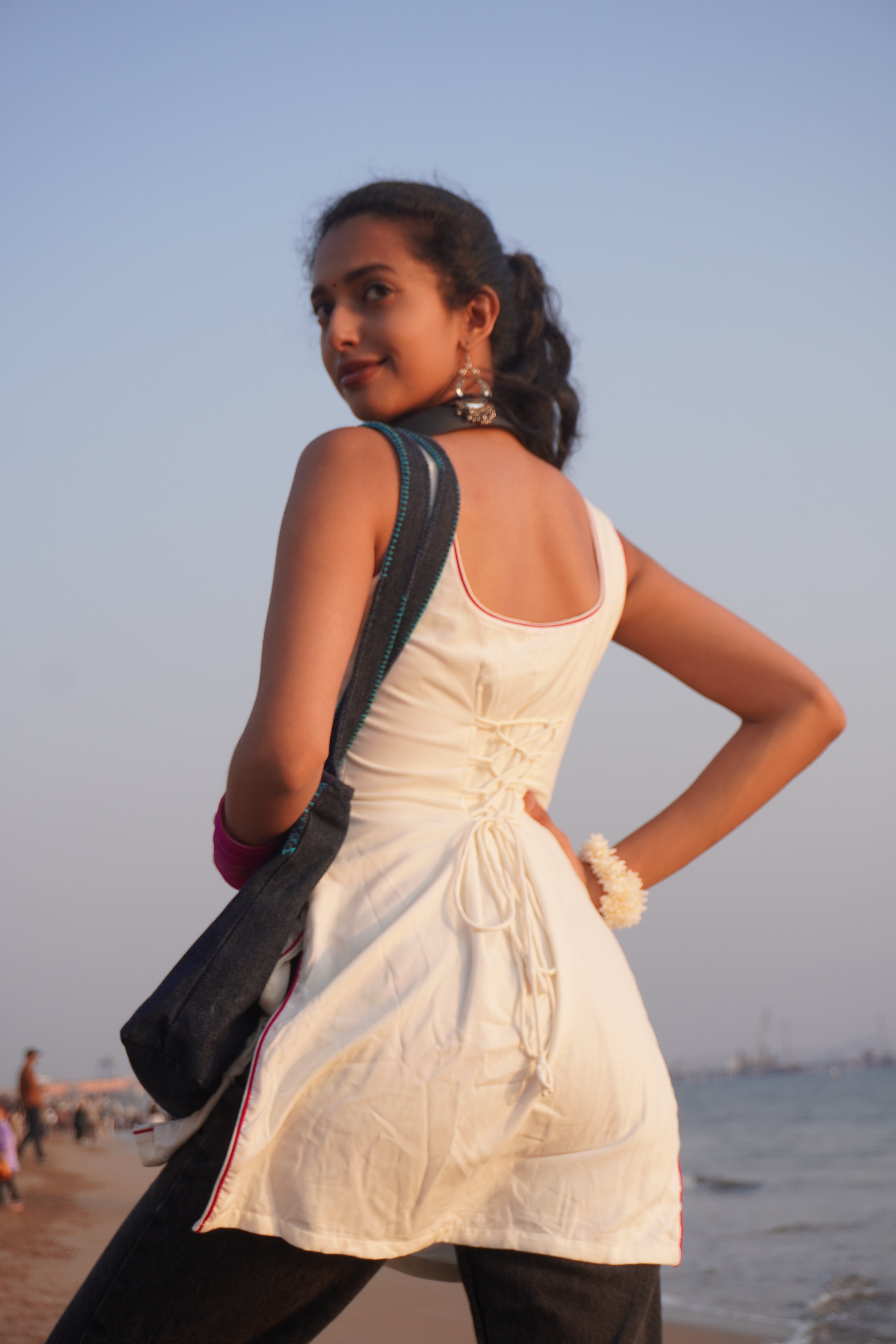 Ria Nalavade in a Bindee white Tank Top kurti back profile showing the corset back detail